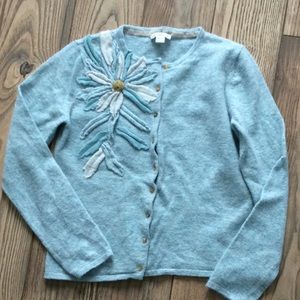 Light blue cardigan with flower